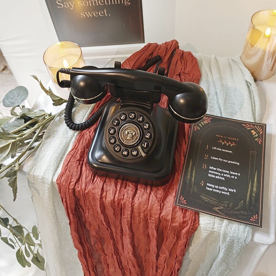 Audio guestbook phone styled with eucalyptus, sage fabric and a printed instruction card